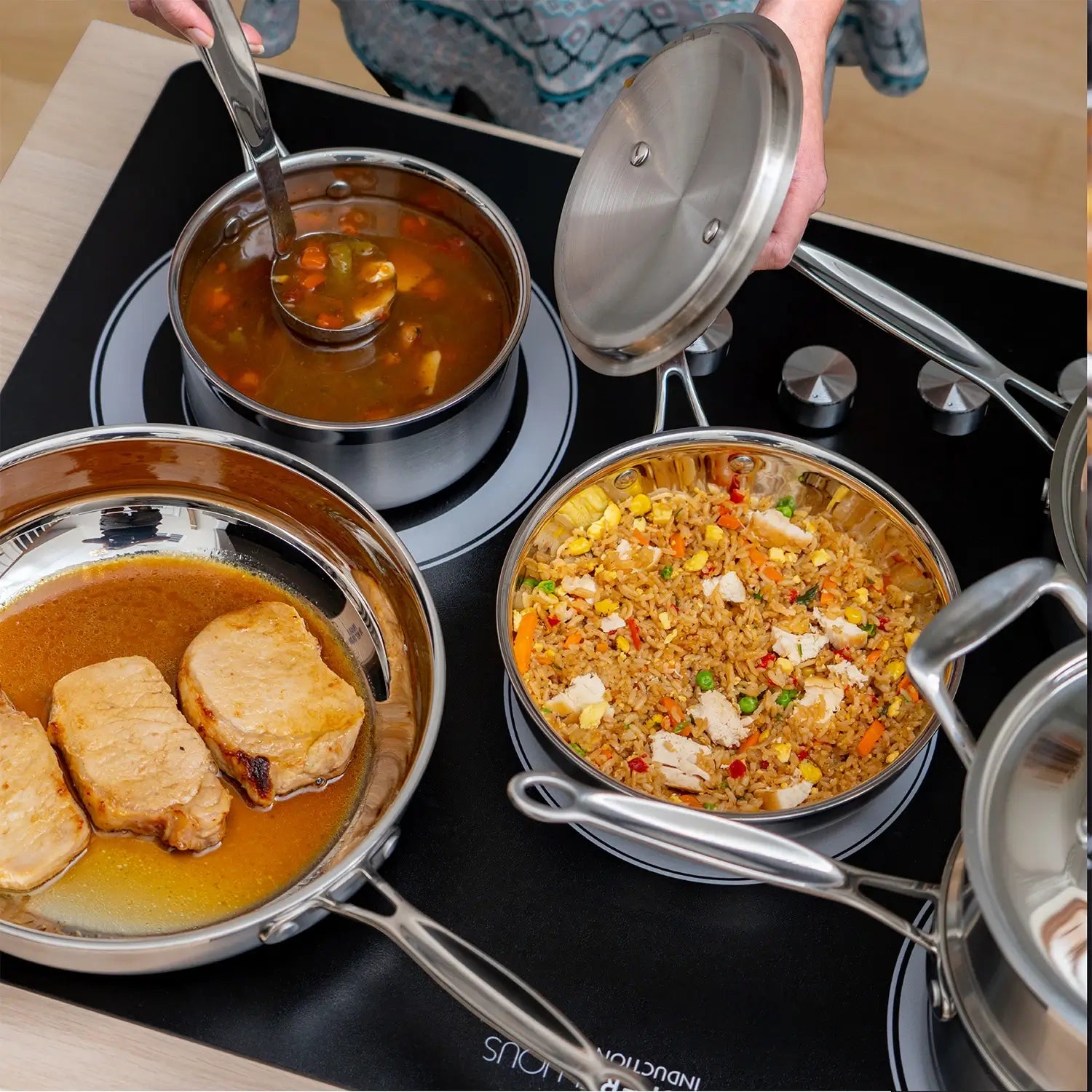 Pots filled with food on oven