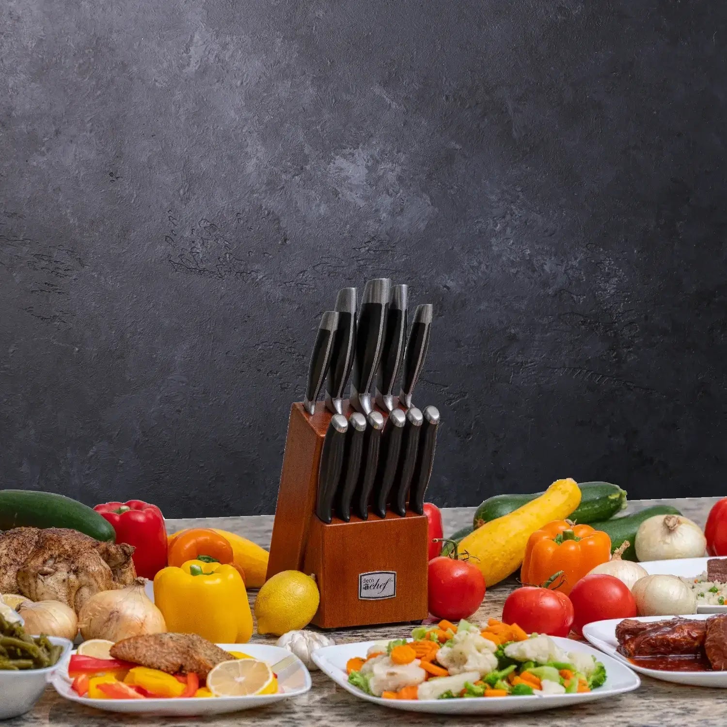 Deco Chef 12-Piece Knife Set surrounded by vegetables on a table
