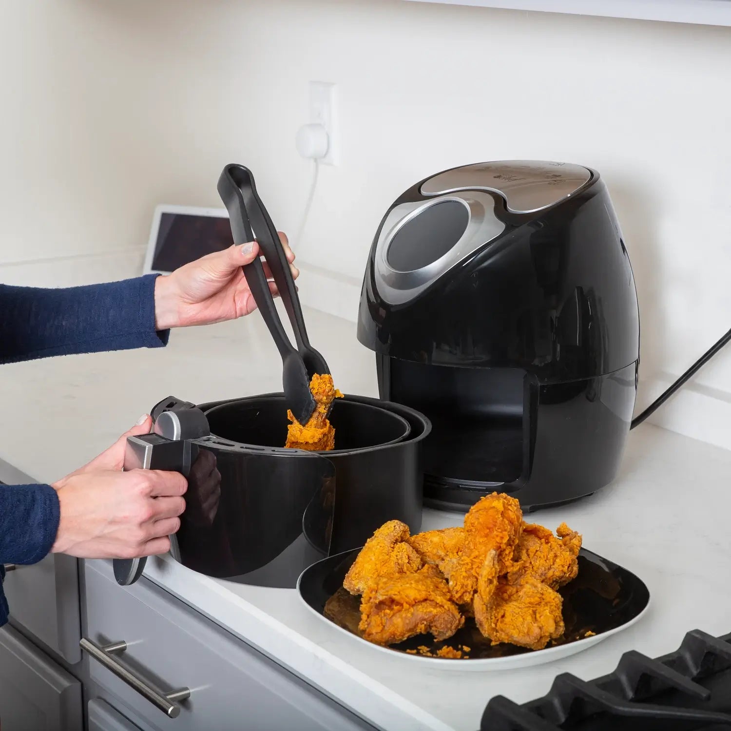 Taking chicken out of air fryer