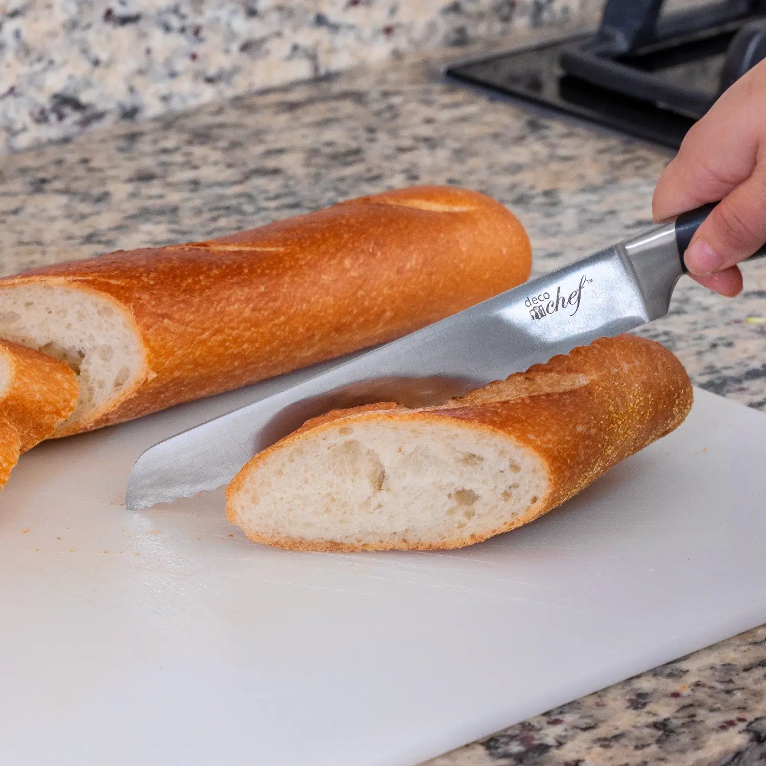Deco Chef 12-Piece Knife Set slicing through bread