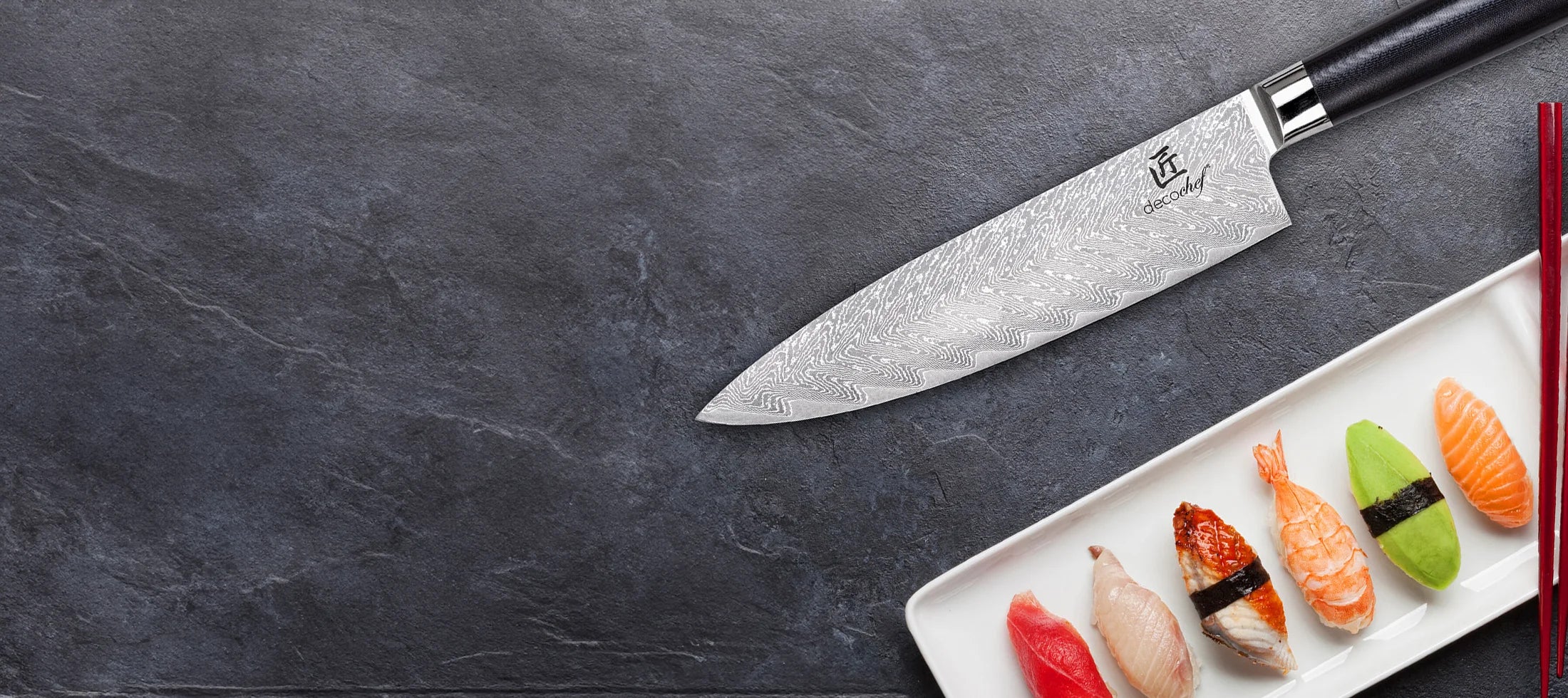 Chef knife dark background with sushi platter