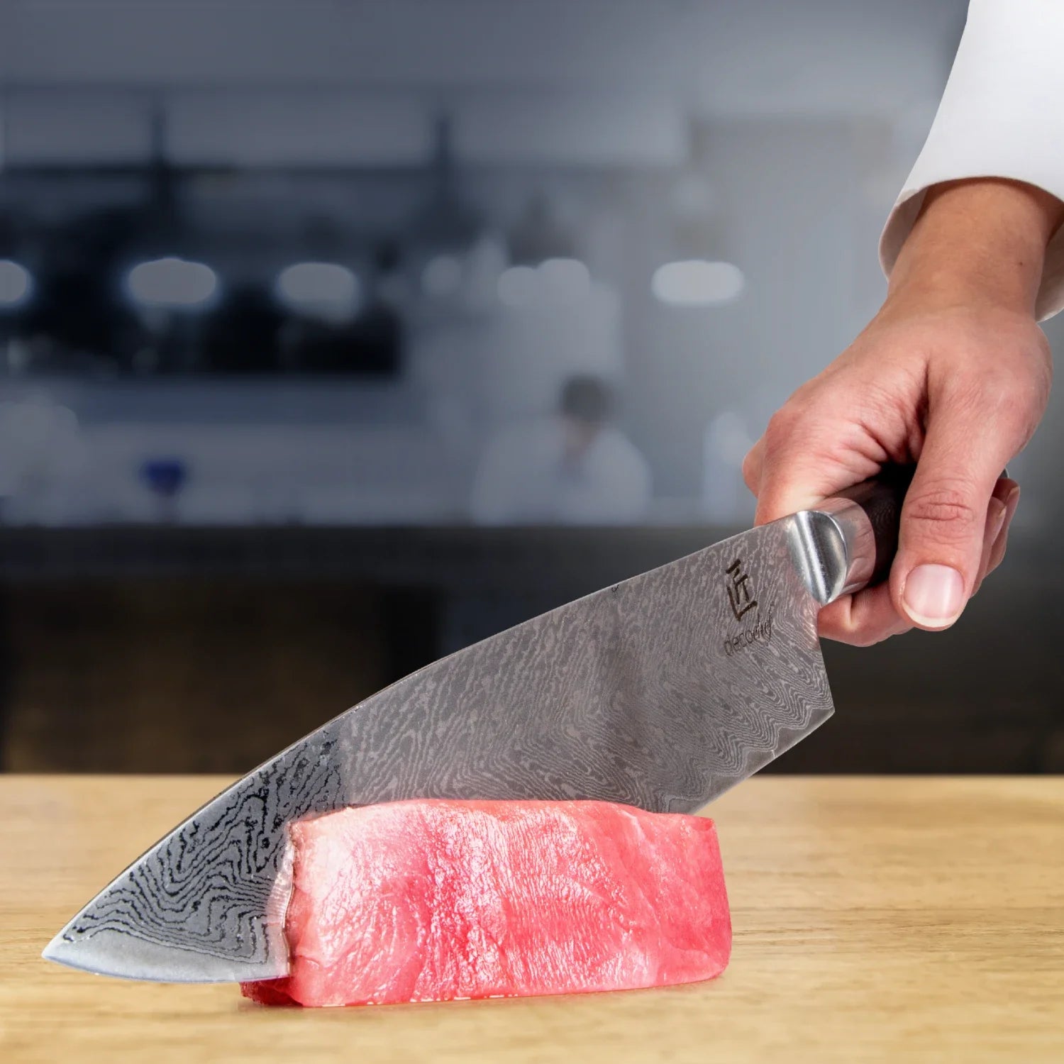Deco Chef Chef Knife slicing a piece of meat