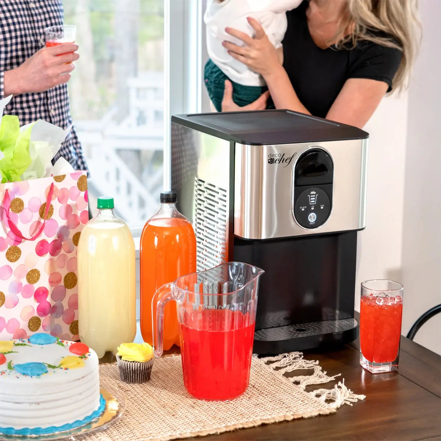 Ice maker surrounded by drinks 